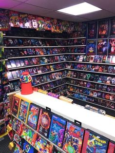 a store filled with lots of video game memorabilia and games for sale on the shelves