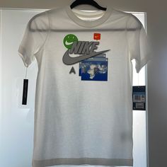 New With Tags, Great Price White Graphic Design Shirt For Spring, Nike White Tops For Summer, Nike Short Sleeve Tops With Graphic Design, White Sporty Shirt For Summer, Blue Graphic Design Top For Spring, Nike Sporty White Shirt, White Nike Tops For Spring, Nike White Cotton Shirt, Nike White Short Sleeve Shirt