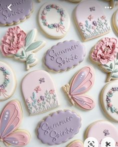 decorated cookies with flowers and butterflies are displayed on a white surface, surrounded by the words summer solstice