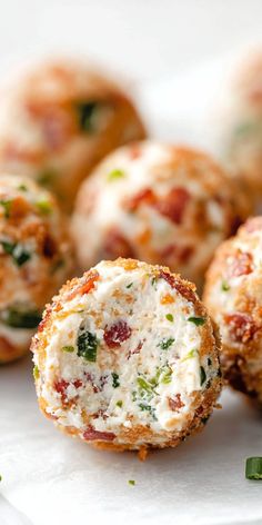 small appetizers with cheese and herbs on them