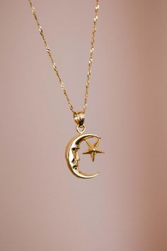 14k Solid Yellow Gold Moon And Star Pendant Charm | Luna Estrella Necklace | Astrology Jewelry Gift * Metal: 14K Yellow  Gold * Pendant Length: 16.9mm (0.6") * Pendant Width: 12.6mm (0.4'') * Pendant Avg Weight: 1.0g * Stamp: 14K * Chain Style & Length : 14k Yellow Gold 18"  Singapore (necklace set-option) * Complimentary Gift Box Guaranteed 14k real Gold NOT gold plated or filled. Image may be enlarged to show details. Please read description.  Return Policy  I gladly accept returns and exchanges Contact me within: 3 days of delivery Ship items back within: 7 days of delivery I don't accept cancellations But please contact me if you have any problems with your order. The following items can't be returned or exchanged Because of the nature of these items, unless they arrive damaged or defe Celestial Rose Gold Jewelry With Star Charm, Rose Gold Celestial Jewelry With Star Charm, Celestial Crescent Jewelry With Star Charm, Celestial Style 14k Gold Half Moon Jewelry, Celestial Half Moon 14k Gold Jewelry, Yellow Gold Moon Necklaces With Star Charm, Celestial Moon Shaped 14k Gold Filled Jewelry, Gold Star Jewelry With Moon Phase Detail, Gold Star-shaped Jewelry With Moon Phase Detail