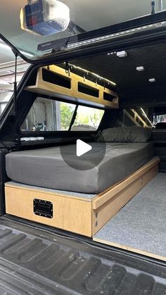 the bed in the back of a truck is made to look like it has been built