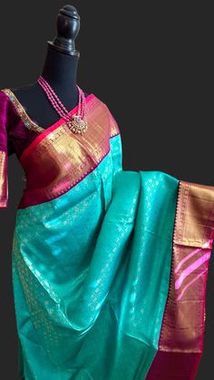 Sea Green blue  to purple pure zari kanchi pattu saree with hand embroidered blouse , comes with Fall pico done. Fully stitched blouses.  DETAILS AND CARE Color : sea blue Green brocade gold pure zari  silk with silver   zari  Weight : 600 - 800 grams Length : 5.5 m saree + 0.7 m blouse Width : 48 Inches Fabric : Pure Kanjivaram Pattu Plain Silk Craft Description : Kanjivaram, Kanjeevaram Wash Care : Dry Wash Only Shipping Time : 5 - 7 Working days We Ship Worldwide Comes with prestitched blouse size 36 goes up to 42 very beautiful high quality kanjivaram pure silk saree. SHIPPING AND RETURNS Shipping Policy : Shipping days as mentioned above, subject to changes based on the government regulations around the prevailing pandemic situation.  Return Policy : No returns on the orders that have Tussar Silk Saree With Zari Work And Temple Jewelry, Blue Tissue Silk Saree With Zari Weaving, Designer Blue Paithani Silk Lehenga, Blue Handloom Tissue Silk Traditional Wear, Banarasi Silk Saree With Zari Weaving And Temple Jewelry, Banarasi Silk Saree With Zari Weaving, Paithani Silk Saree With Pallu, Paithani Silk Saree With Pallu And Temple Jewelry, Green Saree With Cutdana In Temple Jewelry Style