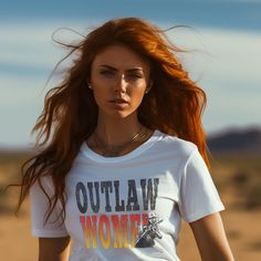 Embrace your wild side with the Outlaw Women Hank Williams Jr. Graphic Tee from Moody Mare Boutique. Crafted for the rebellious at heart, this trendy tee celebrates iconic Western flair and timeless music. The versatile design and soft fabric make it a must-have for any wardrobe, ensuring you stand out while remaining comfortable. At Moody Mare Boutique, we redefine Western fashion trends by offering unique pieces that blend tradition with modern style. Find your perfect fit and express your ind Outlaw Women, Bar Counter Design, Hank Williams Jr, The Outlaw, Western Music, Women Graphic, Hank Williams, Trendy Tee, Country Western