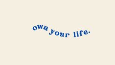 the words own your life written in blue ink