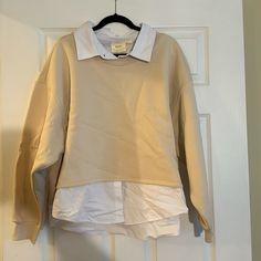 Tan Sweater With Attached White Button Up Detailing To Collar And Bottom Edge. Beige Crew Neck Blouse For Work, Cream Button-up Tops For Layering, Beige V-neck Sweater With Button Closure, Brown V-neck Sweater With Button Closure, Tan Sweater, White Button Up, Button Up, Top Blouse, Collar