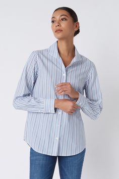 Kal Rieman Ginna Box Pleat Shirt in Multi Stripe Navy on Model Looking Right Cropped Front View Daywear Tops With Striped Spread Collar, Work Shirt With Striped Collar And Shirttail Hem, Workwear Shirt With Striped Collar And Shirttail Hem, Elegant Top With Striped Fold Down Collar, Business Casual Shirt With Concealed Placket, Classic Top With Striped Collar For Daywear, Modern Top With Striped Collar For Work, Modern Tops With Striped Collar For Work, Modern Fitted Tops With Striped Collar