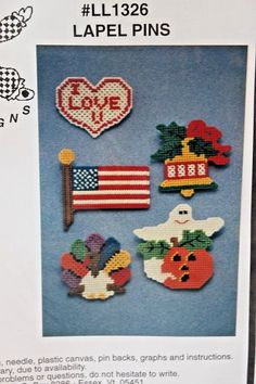 a package of needled pins with the words love on them and an american flag