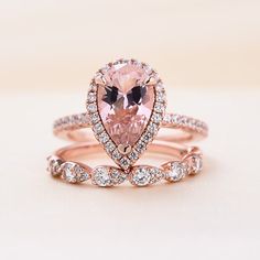 an engagement ring set with a pear shaped morganite