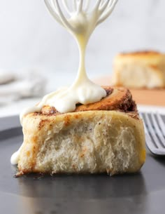 a piece of bread with cream on top