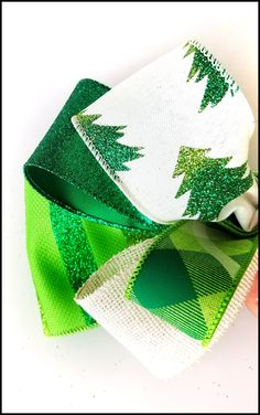 a green and white christmas tree ribbon