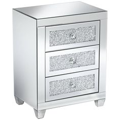 two drawers with silver sparkles on the bottom and one drawer is open to show its contents