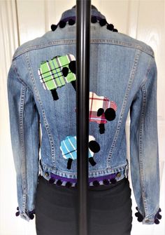 "Genuine fcuk size: m  chest: when laid flat measures 17\" from underarm to underarm height: from the back of the neck to the bottom of the waistband measures 19.5\" pre-loved faded blue stretch denim jacket embellished with tartan sheep & purple wellies motifs reworked customised and semi hand stitched. purple tartan sheep and purple wellies motifs to the front three tartan sheep to the back one green - one red - one turquoise luxury purple pom-pom braid to the hemline & cuffs individual and unique casual / festival wear to be seen inmade in yorkshire please note: all items i sell are sourced by me and then individually customised and reworked...no two items will be the same. i am happy to take order requests." Denim Blue Patchwork Outerwear In Recycled Denim, Fitted Patchwork Outerwear In Recycled Denim, Spring Recycled Denim Patchwork Outerwear, Blue Patchwork Outerwear In Recycled Denim, Luxury Patchwork Denim Jacket, Purple Tartan, Luxury Purple, Festival Wear, Hand Stitched