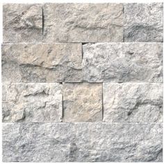 a stone wall that looks like it is made out of cement