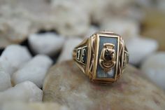 This is the perfect option for those who like cool, unique jewelry, and the luxury, shine of gold. This ring is well made, cute and/or elegant in design, and very desirable. The vintage ring decorated with the emblem in the center and signed ''1947''. The ring has a hallmark, 10k BBCC ELG. Its weight is 4.5 grams and is a size 5 1/4. In good condition. Everyone interested in the jewelry should remember that he or she must like their jewelry- not just at first sight.... but for always. To have it 14k Stamped Art Deco Jewelry Gift, Vintage Enamel Jewelry With Polished Finish, Luxury Jewelry With Maker's Mark For Anniversary, Vintage Yellow Gold Jewelry For Commemoration, Gold Enamel Art Deco Jewelry, Gold Art Deco Enamel Jewelry, Art Deco Polished Signet Ring As Gift, Yellow Gold Jewelry With Maker's Mark As Gift, Gold Enamel Signet Ring For Anniversary