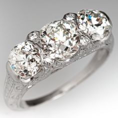 an antique three stone diamond ring