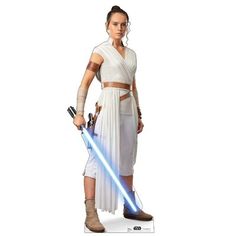 a woman dressed as star wars character holding a light saber