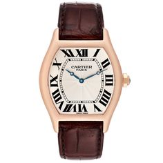 Cartier Tortue XL CPCP Collection Rose Gold Mens Watch 2763 W1546051. Manual winding movement. Cartier Calibre 9601 MC. 18k rose gold Tonneau shape case 48 mm x 38 mm. Octagonal crown set with a faceted sapphire. Sapphire exhibition case back. 18k rose gold bezel. Scratch resistant sapphire crystal. Silver guilloche dial with blued steel apple-shaped hands and black painted Roman numeral hour markers. Minute markers around the inner rim. Brown leather strap with 18k rose gold deployant clasp. Classic Brown Watch With Diamond Hour Markers, Classic Cartier Chronograph Watch Accessories, Classic Cartier Watch Accessories With Chronograph, Luxury Cartier Analog Watches, Classic Cartier Chronograph Watch, Cartier Chronograph Watch For Business, Classic Cartier Chronometer Watch, Classic Cartier Watch With Subdials, Cartier Calibre