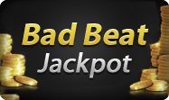 the words bad beat jackpot are in front of stacks of gold coins on a black background