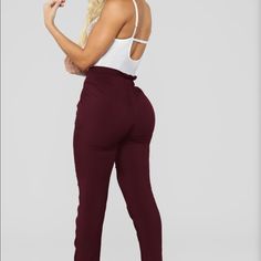 Mid-Rise Woven Fabric Non-Stretch Fabric Waist Tie Detail Tapered Skinny Leg 28" Inch Inseam 100% Rayon Red High Waist Bottoms For Going Out, Chic High-waisted Burgundy Bottoms, Casual Red Bottoms For Date Night, Burgundy Casual Bottoms For Night Out, Classic Paper, Burgundy Pants, Fashion Nova Pants, Waist Tie, Woven Fabric