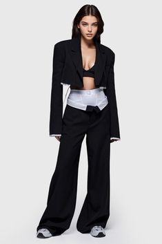 Cut from cropped blazer with lapel collar and long sleeve, the suit features unfinished trims for a touch of sophistication. Paired with high waisted trousers with wide legs and front button closure, this suit is the ideal addition to any wardrobe.Fabric: Cotton, Polyester Blazer With Crop Top Outfits, Formal Fall Sets With Wide-leg Shape, Chic Formal Set With High-waisted Pants, Chic Tailored Sets With Lapel Collar, Elegant High Waist Workwear Sets, Elegant High-waist Workwear Sets, Elegant High-waist Sets For Fall, Spring Tuxedo Pantsuit With Lapel Collar, Chic Office Bottoms With Suit Collar