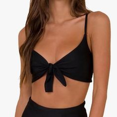 Brand New Blooming Jelly Bikini Top - New With Tags - Basic Black Swim Top With Bow In Front - Pull On - Adjustable Straps - Removable Cups - Size Large Black Tie-side Bottom Swimwear Bra Friendly, Black Swimwear With Adjustable Straps And Tie-side Bottom, Black Nylon Swimwear With Built-in Bra, Black Swimwear With Built-in Bra And Tie-side Bottom, Black Moisture-wicking Beachwear Bottoms, Bandeau Tankini Top, Top With Bow, Bandeau Tankini, Tankini Swimsuit Top