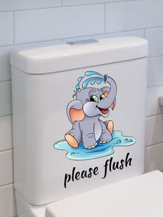 a white toilet with an elephant sticker on it's lid and the words please flush