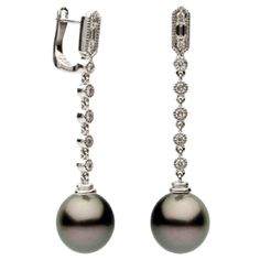 This Earring features: Pearl size : 10-11mm Nature: Tahitian Cultured Pearl Luster: AAA Exc. Nacre: Very Thick Metal Purity: 18k Metal Type: White Gold Earrings Metal Weight: 3.4g Diamond Count: 16 Diamond Weight: 0.32 It can be ordered with South Sea Pearls Pearl Diamond Dangle Earrings, Dramatic Earrings, South Sea Pearls Earrings, Tahitian Pearl Earrings, Black Pearls, Pearl And Diamond Earrings, White Gold Earrings, Tahitian Pearls, Women Diamond