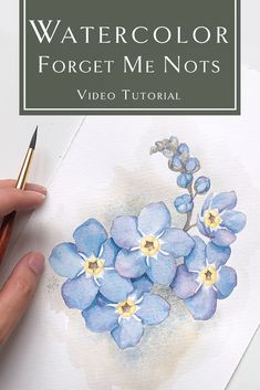 the watercolor forget me nots video is being used to paint blue and white flowers