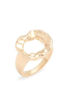 a gold plated ring with an open design