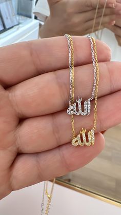 Micro Allah Written Pendant Necklace, Mini CZ  Pave Arabic Necklace, 925 Solid Silver, Dainty Quran Necklace, Islamic Necklace Gift for Her Chain Length40+5 cm This lovely earring is a perfect gift for your loved ones or just for yourself! 💫Listing is for 1 piercing . Please choose a color in the variations section. Jewelry is made with 925 sterling silver and plated with 14K rose gold/gold PRODUCTION  TIMES  * All items are custom made to order. Our production time is about 1-3business days. DELIVERY We use DHL shipping to the USA and the estimated shipping time is 4 - 7 business days. For Europe, you can receive your package in 3 weeks with the local cargo company. CONDITIONS FOR USING YOUR JEWELRY  Since all the delicate models we produce are handcrafted, it is necessary to be careful Silver Diamond Charm Necklace As Gift, Gift Charm Necklaces With Diamond Accents In Sterling Silver, Gift Sterling Silver Charm Necklaces With Diamond Accents, Sterling Silver Charm Necklace With Diamond Accents For Gift, Gift Sterling Silver Charm Necklace With Diamond Accents, Silver Charm Necklaces For Mother's Day, Islam Necklace, Islamic Necklace, Allah Necklace