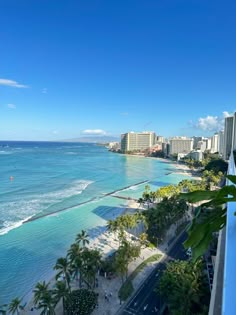 the beach and ocean are seen from an apartment building in waikiki, oahu