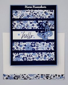 a card with blue and white flowers on it