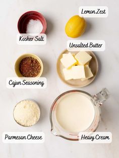 ingredients to make lemonade are shown on a white counter top, including butter and sugar