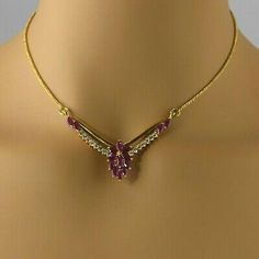 22K Yellow Gold Ruby Marquise and CZ Chevron Necklace, 15 marquise rubies, 2.5x6mm, 16 round CZ brilliant stones, 16 inch length, 2 inch chevron pendants, S hook handmade, Circa 1990, 13.15 grams Stock # BB261N06 This listing contains photographs of the actual item you will receive. Our items are in excellent condition with little or no signs of wear and many are one of a kind pre-owned estate finds. Please look closely at the pictures in this listing as they are part of the product description. Trendy Silver Jewelry, Chevron Necklace, S Hook, Fine Jewelry Designers, Yellow Gold Earring, Boston Ma, Gold Coins, Earring Backs, Pendant Necklaces