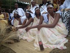 a group of people sitting next to each other