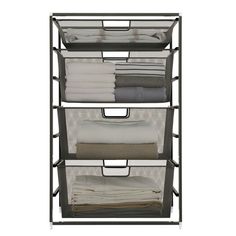 three tiered metal storage unit with mesh baskets on each side and folded linens in the bottom