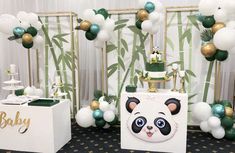 a panda themed birthday party with balloons and decorations