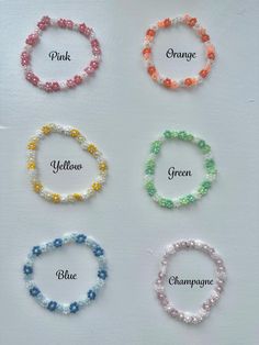 🌸 Comes in pink, orange, yellow, green, blue, and champagne.  🌼 Cute, dainty, and colorful beaded flower bracelets. 🌸 Using the sizing guide, select the appropriate size for your wrist measurement. Multicolor Flower-shaped Beaded Bracelets For Summer, Pink Flower Beaded Bracelets For Summer, Pink Flower-shaped Friendship Bracelets With Tiny Beads, Pink Flower Friendship Bracelets With Tiny Beads, Pink Flower-shaped Friendship Bracelets For Summer, Pink Flower Friendship Bracelets For Summer, Summer Flower Beaded Bracelets, Dainty Flower-shaped Beaded Bracelet With Colorful Beads, Dainty Flower-shaped Beaded Bracelets