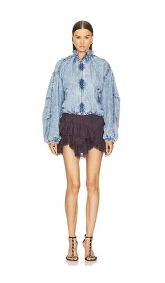 Find ISABEL MARANT ÉTOILE Plume Jacket on Editorialist. Isabel Marant Etoile Plume Jacket in Blue. - size 36/4 (also in 34/2, 38/6) Isabel Marant Etoile Plume Jacket in Blue. - size 36/4 (also in 34/2, 38/6) Self: 100% lyocell Lining: 100% cotton. Made in Tunisia. Dry clean recommended. Front zipper closure. Drawstring collar and hem. Snap button pockets. Elastic cuffs. Denim print cotton fabric. ISAR-WO124. VE0372FA-B3H01E. The standard-bearer for insouciant Parisian chicness, Isabel Marant lau Blue Ruffled Outerwear For Spring, Blue Long Sleeve Outerwear With Ruffles, Fall Blue Ruffled Outerwear, Chambray Jacket, Denim Print, Long Sleeve Outerwear, Denim Outerwear, Wool Blend Jacket, Isabel Marant Etoile