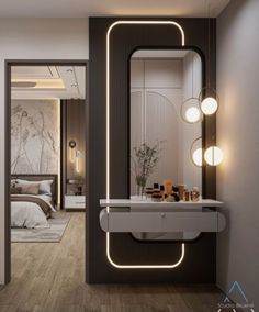 a bathroom with a mirror, sink and lights on the wall next to a bed