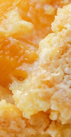 close up view of the inside of an orange pie with crumbs on it