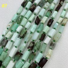 Check out our Coupon Codes Below! ⭐️⭐️⭐️⭐️⭐️ Natural Australian Jade Raw Rough Cube Shape Gemstone Beads Rock Australian Stone Supplies for Jewelry DIY Gemstone Strand 15.5" It's a great gift for your best friends and Family! Materials: #7:Chrysoprase/Australian Jade  Bead Size: approx: 8*12mm-9-15mm Strand length: approximately 15.5" Approx: 24-28 Beads  Hole size: 1mm ★ Discount (All Discounts Exclude Freight) ★★ $2 OFF discount on orders over $35 (USE Coupon Code:SUN02 )  $5 OFF discount on orders over $70 (USE Coupon Code:SUN05 )  $10 OFF discount for orders above $150 (Use Coupon Code:SUN10 )  $20 OFF discount for orders above $300 (Use Coupon Code:SUN20 )  $30 OFF discount for orders above $800 (Use Coupon Code:SUN30 ) About Logistics： ⭐️1.Your order will be shipped for you within 1- Green Jade Natural Stones Beads, Green Agate Beads For Jewelry Making, Polished Green Jade Beads, Green Polished Jade Beads, Green Agate Beads For Healing, Green Spiritual Beaded Necklaces With Stones, Green Spiritual Beaded Necklace With Stones, Spiritual Green Beaded Stone Necklaces, Green Faceted Beads For Jewelry Making