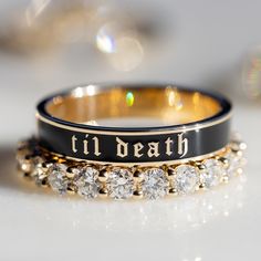 A piece to honor those in your life whose love lasts forever, the Til Death band is perfect for stacking or wearing solo. Due to the width of this band, we recommend sizing a half size up, especially when stacking. This piece is part of our Til Death collection. Shop the collection here. Available in 18k gold Contact us for pricing. Gym Wedding Ring, Black And Gold Wedding Dresses, Black And Gold Wedding Rings, Black And Gold Wedding Dress, Black And Gold Wedding Band, Black Aesthetic Wedding, Goth Wedding Rings, Stackable Engagement Rings, Unique Wedding Ring Sets