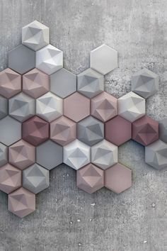 an abstract geometric design made up of hexagonal shapes on concrete wallpaper with cement flooring