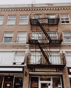 a fire escape on the side of a brick building