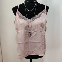 Nwt - Very Beautiful, Lace Trimmed Top. Material Is A Pretty Light Pink. Very Soft, Silky, And Has A Nice Sheen To It. Straps Are Adjustable. A-1 Feminine Pink Lace Top Camisole, Pink Lace Top Camisole, Feminine Pink Tank Camisole, Feminine Pink Cami Camisole, Feminine Pink Tank Top, Spring Pink Lace Top Camisole, Pink Lace Top Camisole For Spring, Chic Pink Camisole For Loungewear, Feminine Pink Camisole Top