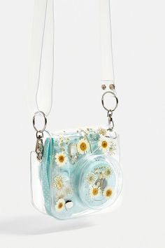 a clear and blue purse with flowers on it