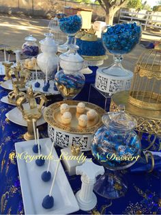 blue and gold dessert table at a princess birthday party