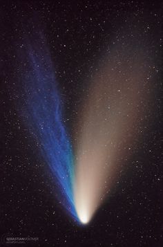 two bright blue and white objects in the sky